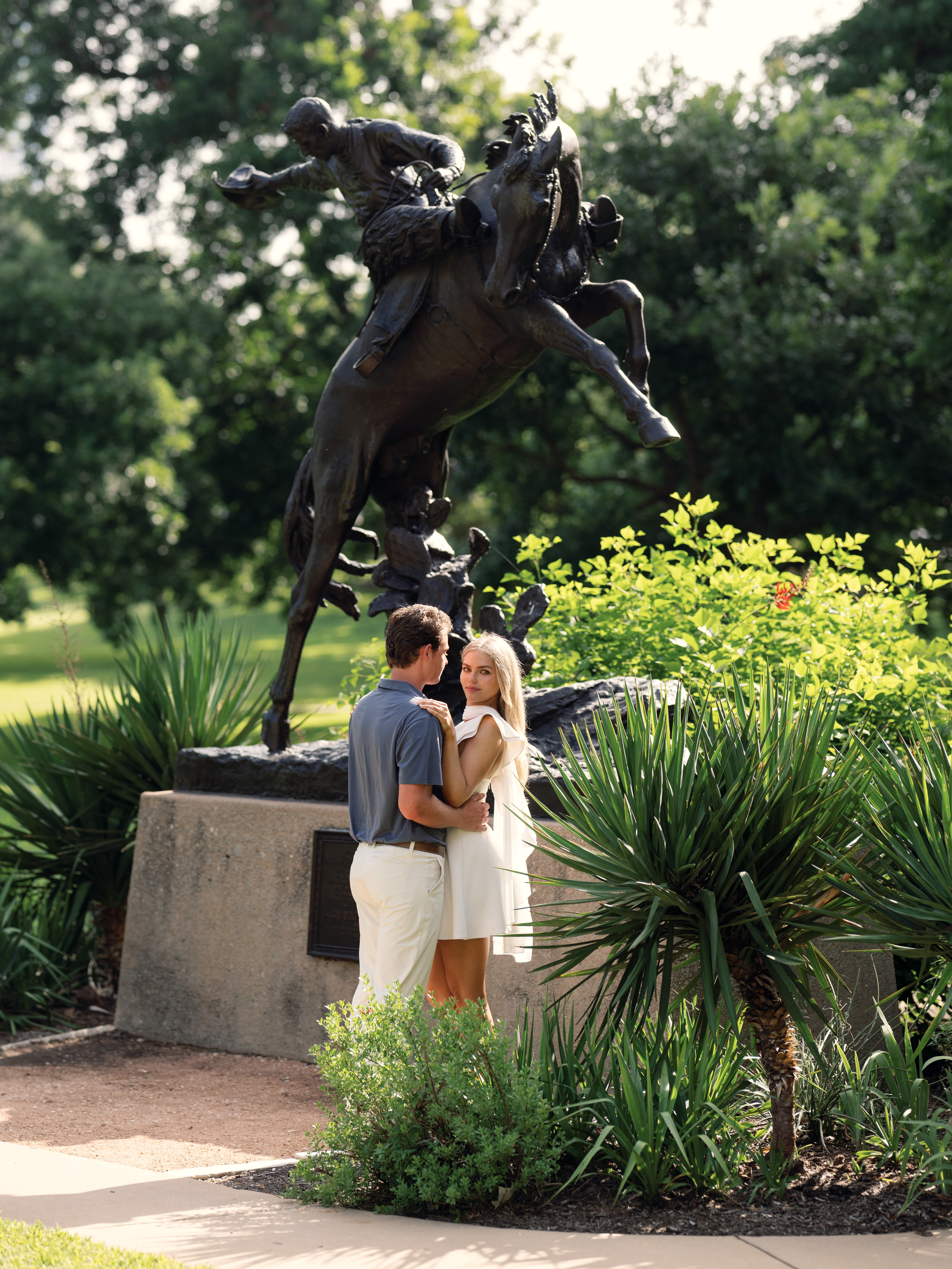 Lucy and Bridger at the foot of the equestrian statue on the Capitol grounds