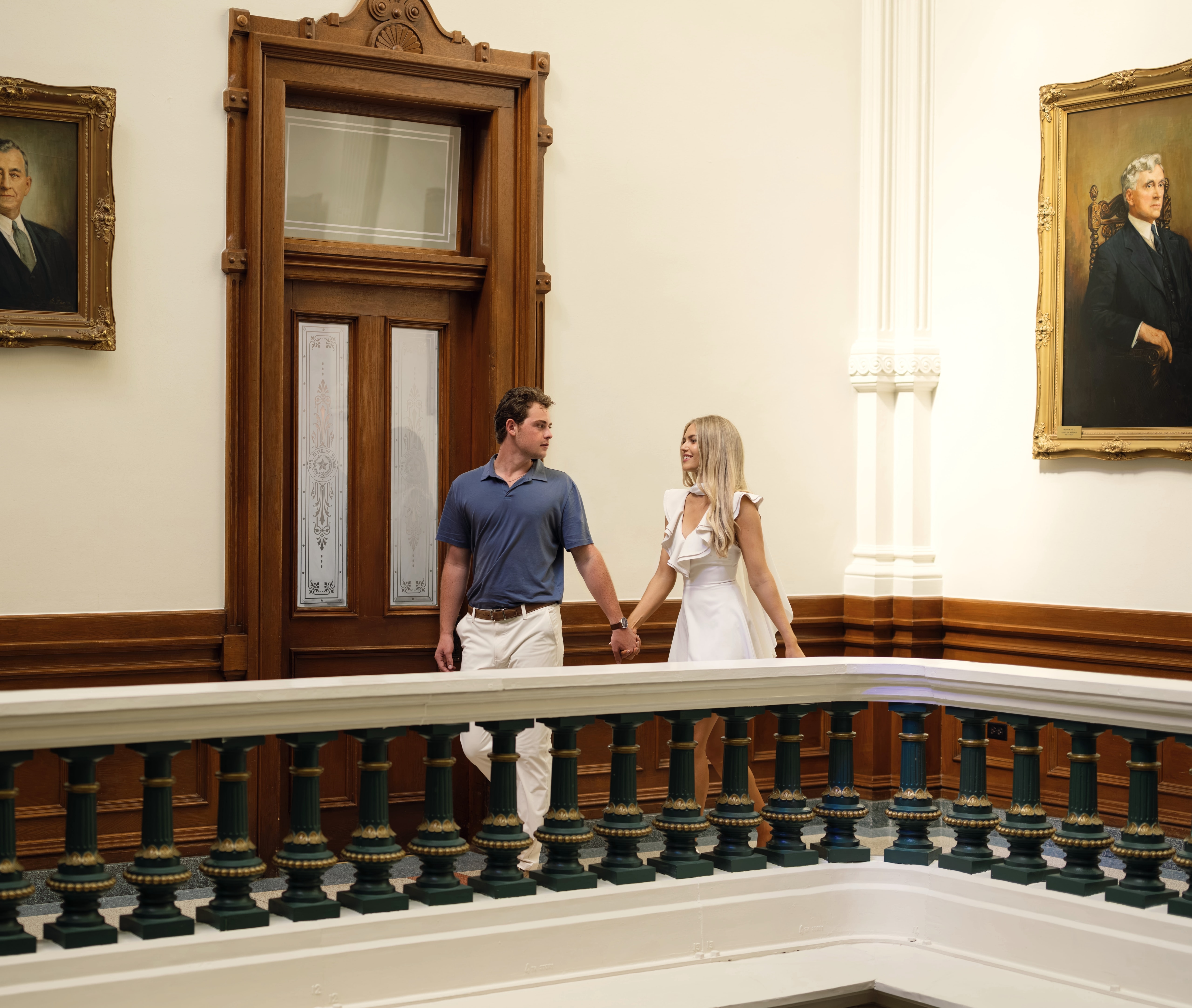 Lucy and Bridger on the upper gallery of the Texas State Capitol